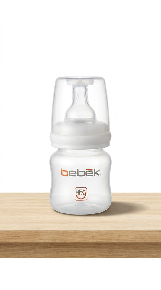 Bebek Starter Set — three baby feeding bottles (2oz, 5oz, 9oz) with pacifier, protective cover and curved cleaning brush